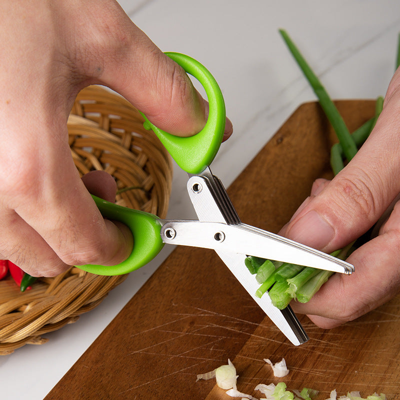 Multi-Blade Herb Scissors — snipping scallions over a basket