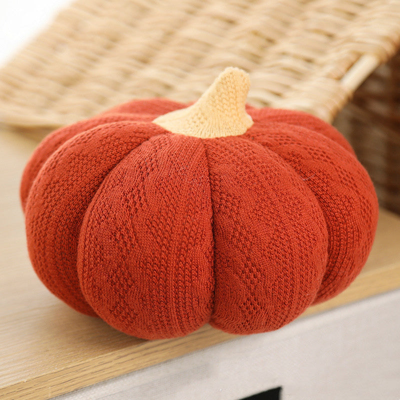 Rust cable-knit plush pumpkin pillow