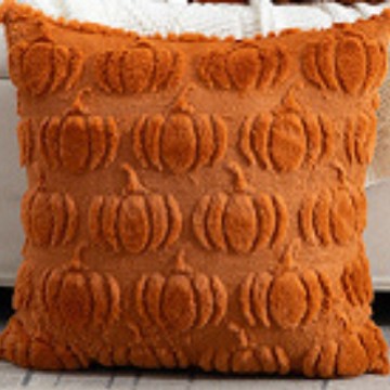 Plush Pumpkin Cushion Covers — close-up of the embossed pumpkin texture in caramel