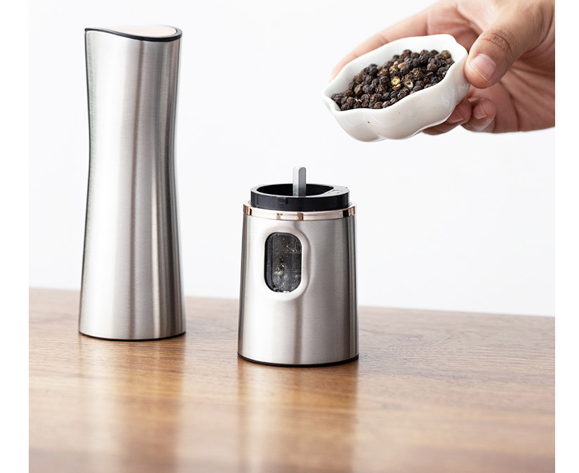 Electric Salt & Pepper Grinder — filling the chamber with peppercorns