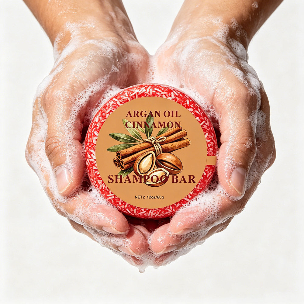 Argan & Cinnamon Shampoo Bar — lathered between wet hands